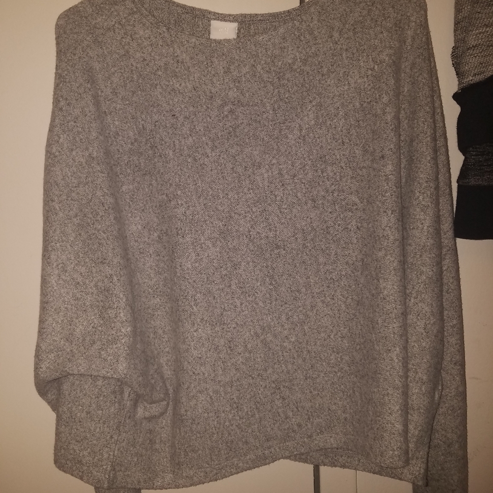 Gray fleecy pullover sweater.